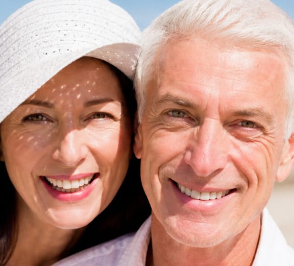 Dental implant model and confident smile